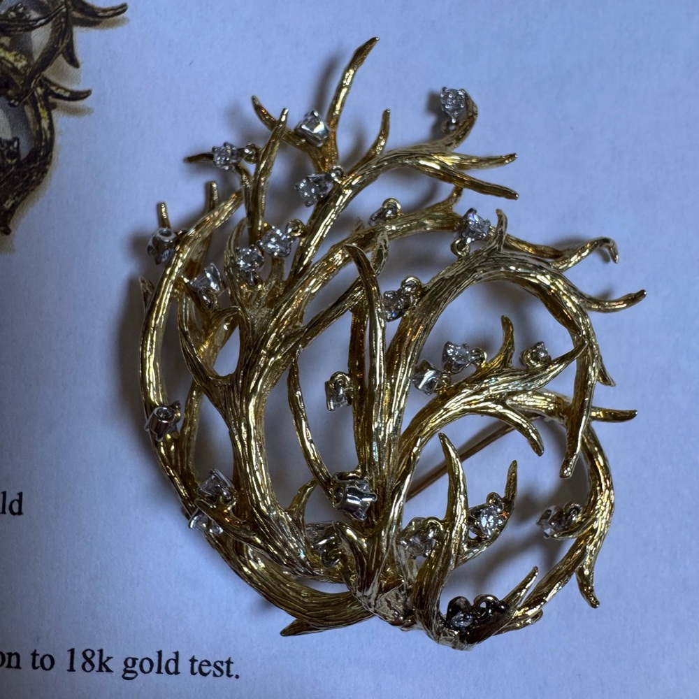 Elegant Gold and Silver Brooch